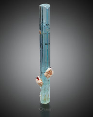 Transparent Aquamarine crystal combine with Garnet and Feldspar