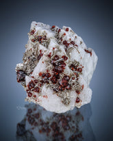 Bunch of Spessartine Garnet with Mica on Feldspar Matrix