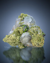 Green Demantoid Garnet Crystals Perched on Matrix