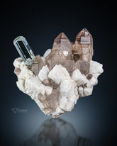 Aquamarine with smoky Quartz and Feldspar Matrix