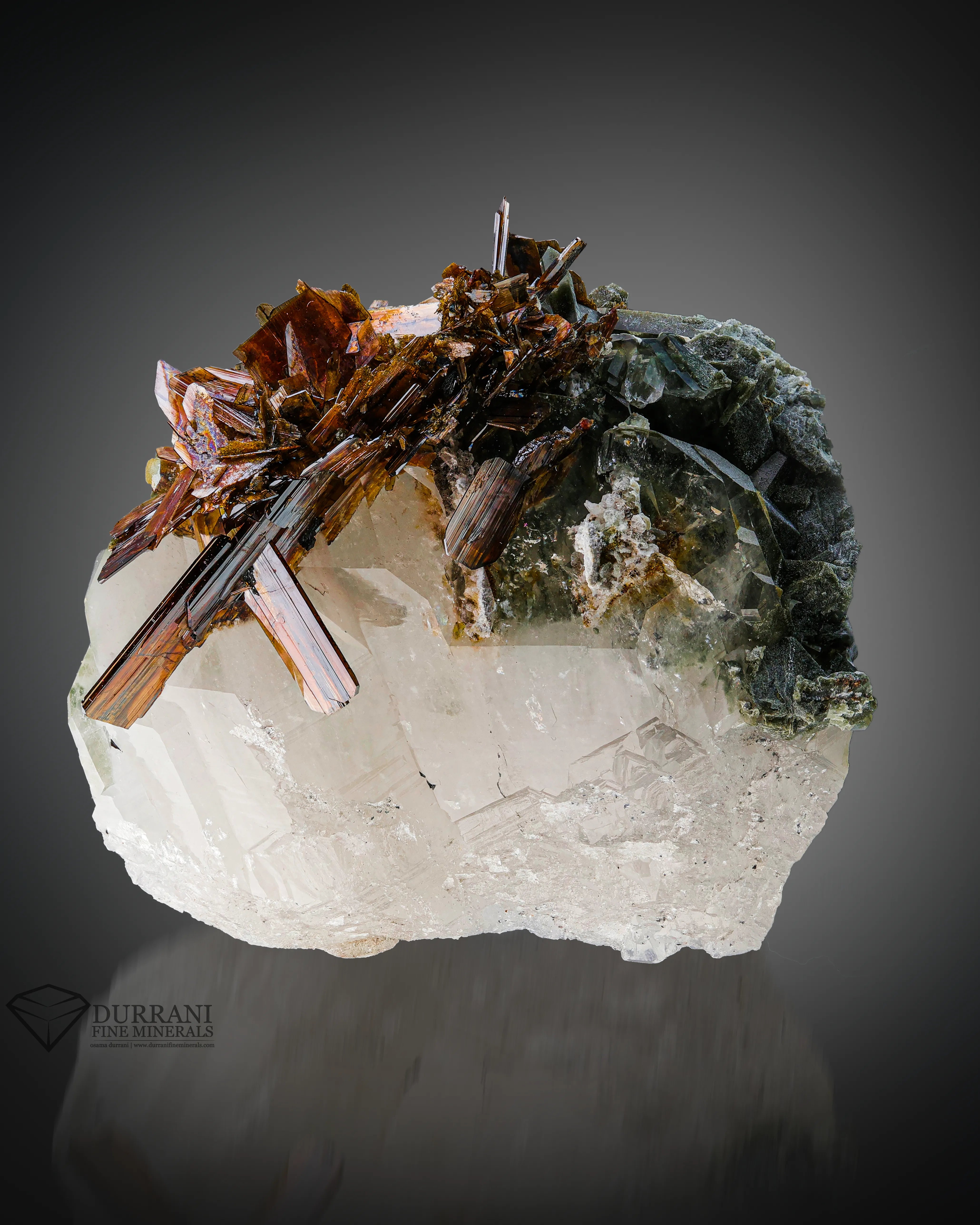 bunch of red Brookite perched on Chlorite Quartz