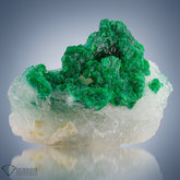 Crystallised bunch of Emerald perched on Calcite