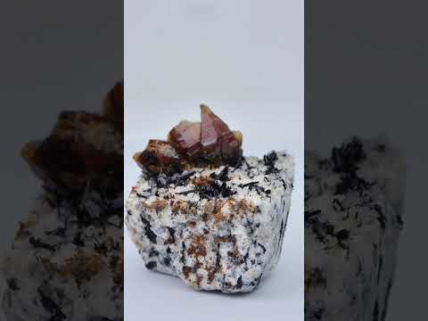 Synchysite with Riebeckite on matrix