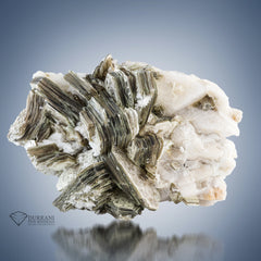 Bunch of Muscovite Mica perched On Microcline Feldspar