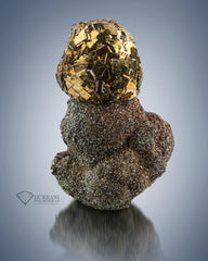 Pyrite ball perched nicely on matrix