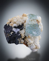 Etched Aquamarine combine with Schorl perched on Cleavelandite matrix