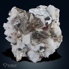 Combination of schrol with Apitite, Mica Spessertine Garnet and wet feldspar.