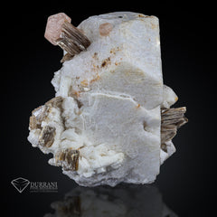 Microcline Feldspar with Pink Apitite on Muscovite.