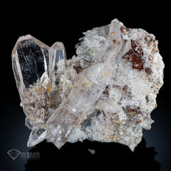 Clear Quartz Cluster with siderite and Rutile spray.