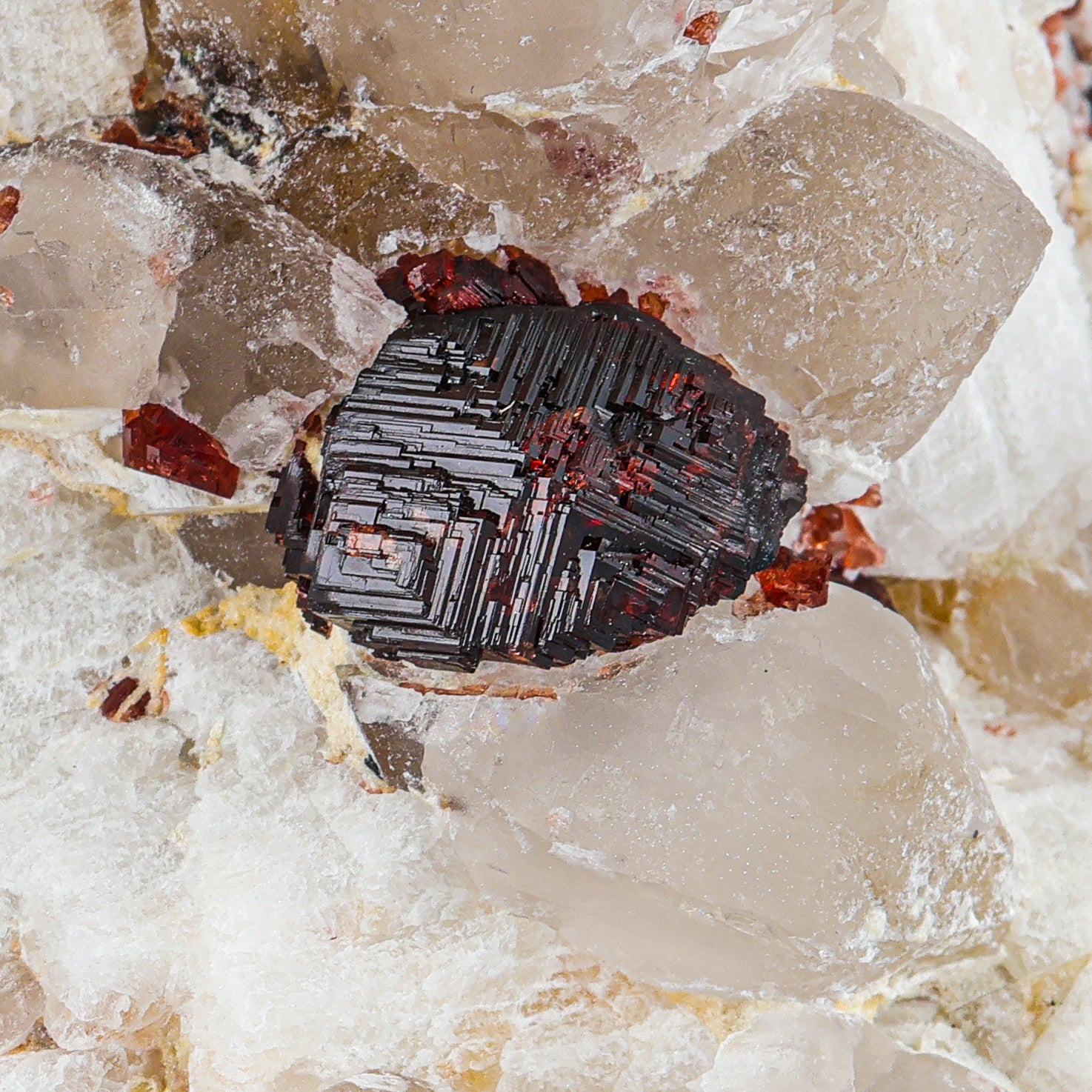 Lovely Spessertine Garnet with Quartz perched on Feldspar.