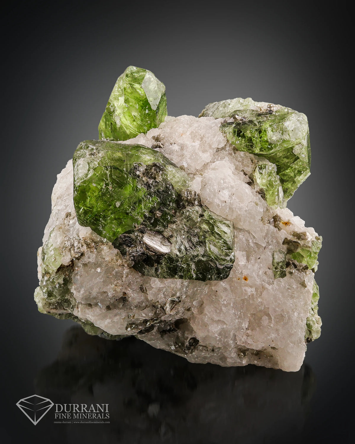 Diopside crystals Perched On Calcite Matrix