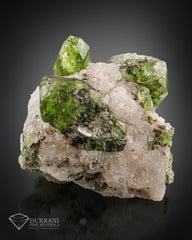 Diopside crystals Perched On Calcite Matrix