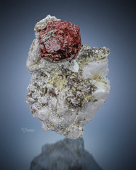 Spessertine Garnet Crystal Perched On Feldspar Matrix