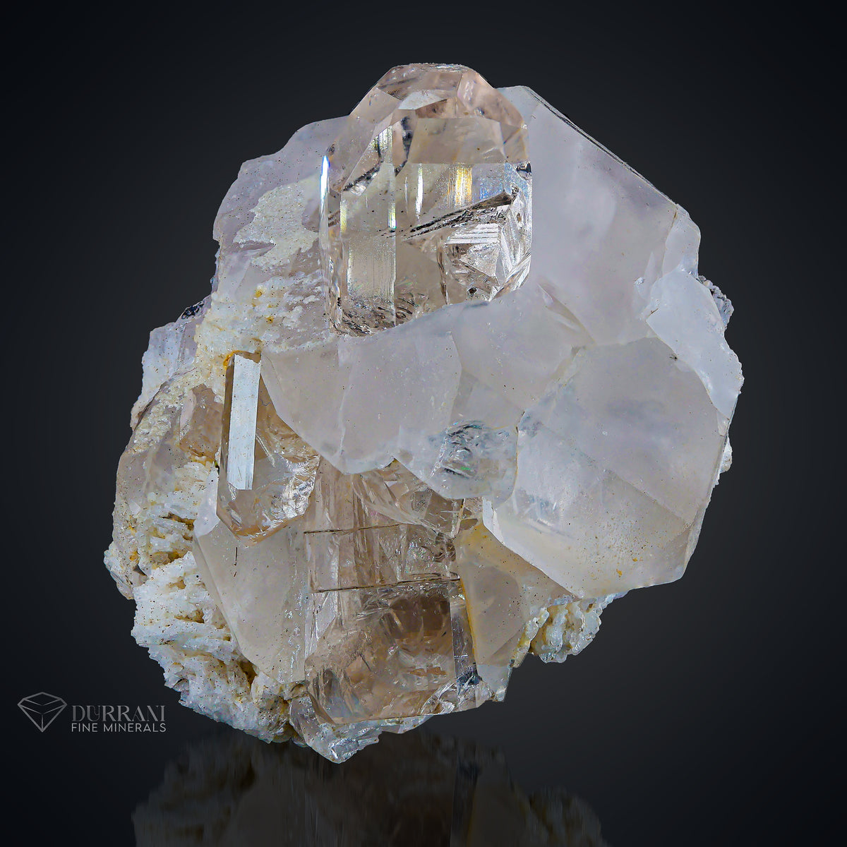 Complex terminated Topaz  on Quartz.