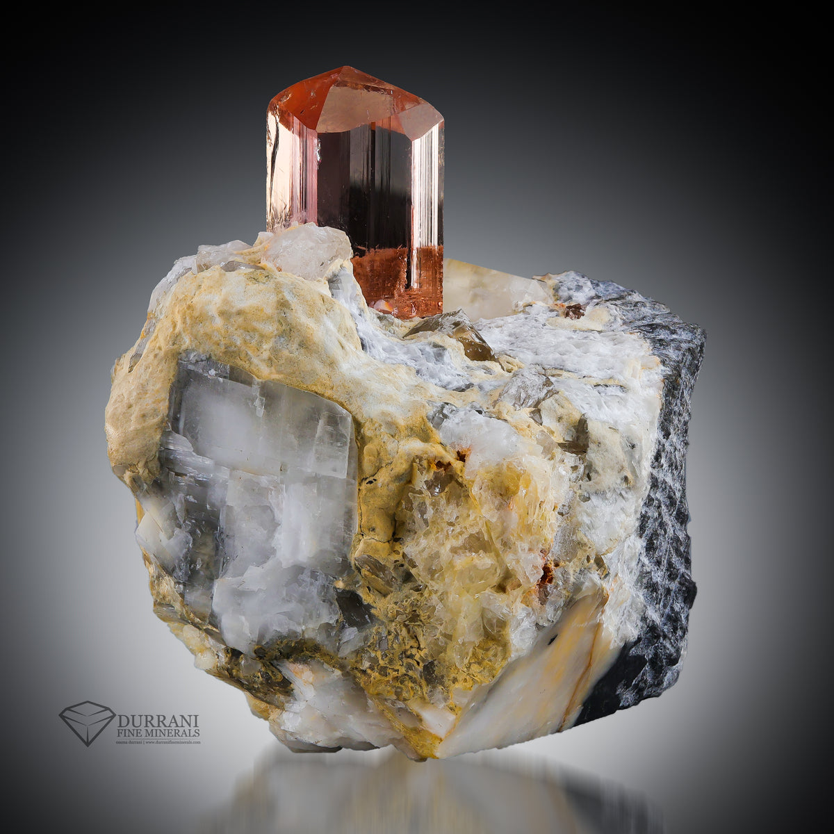 Clear Imperial Transparent Topaz crystal perched on Matrix