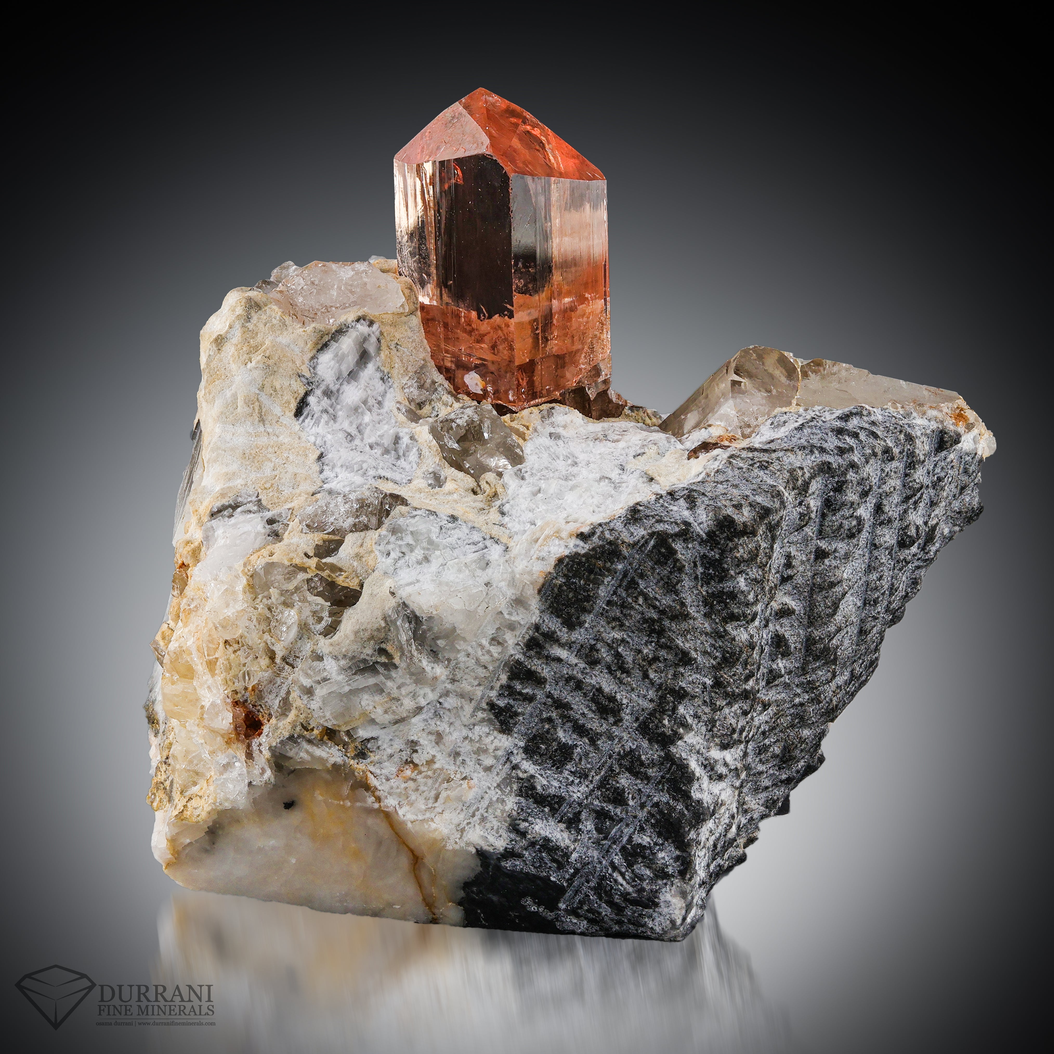 Clear Imperial Transparent Topaz crystal perched on Matrix