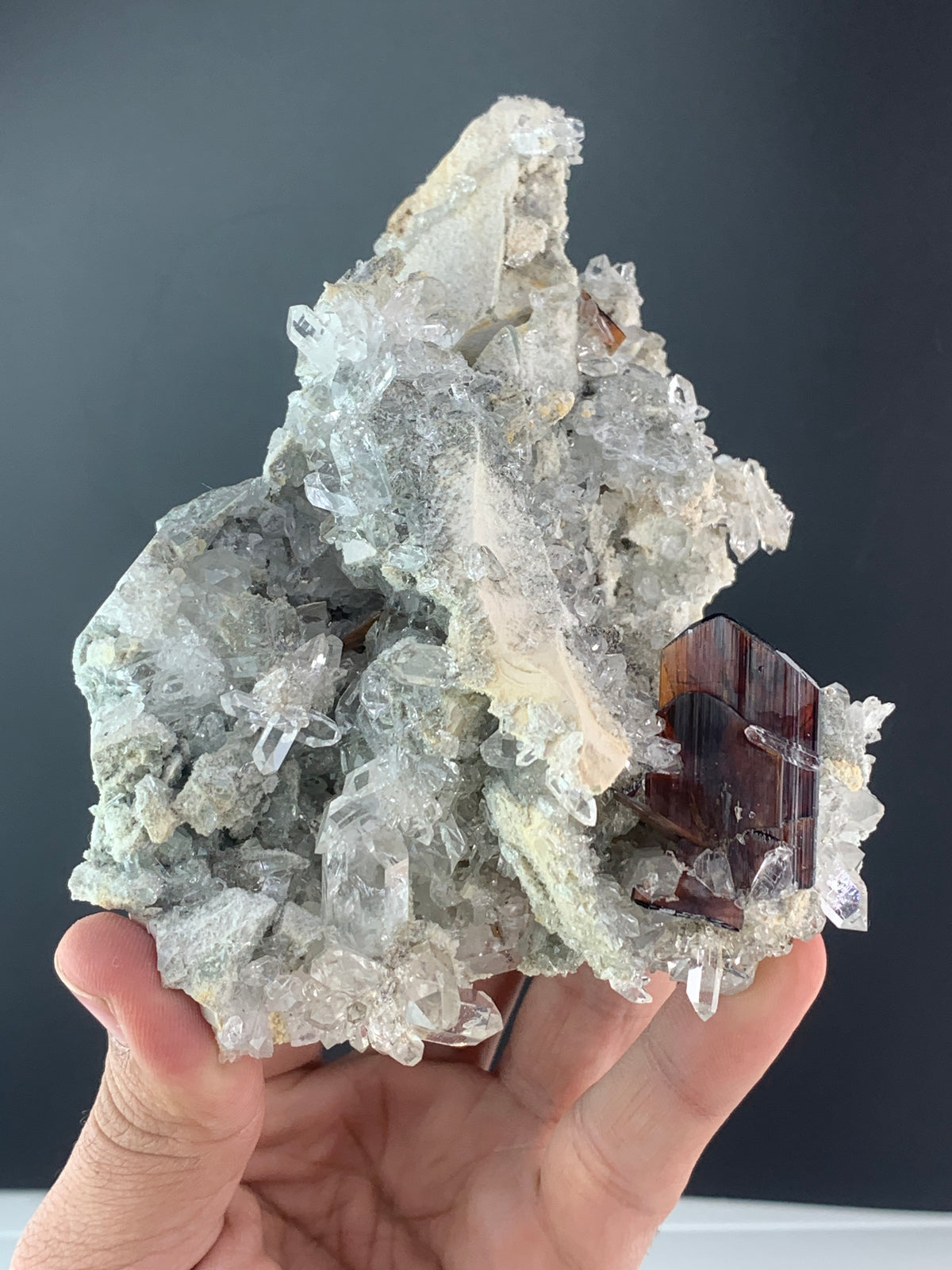 Red colour Brookite Crystals perched on Quartz matrix