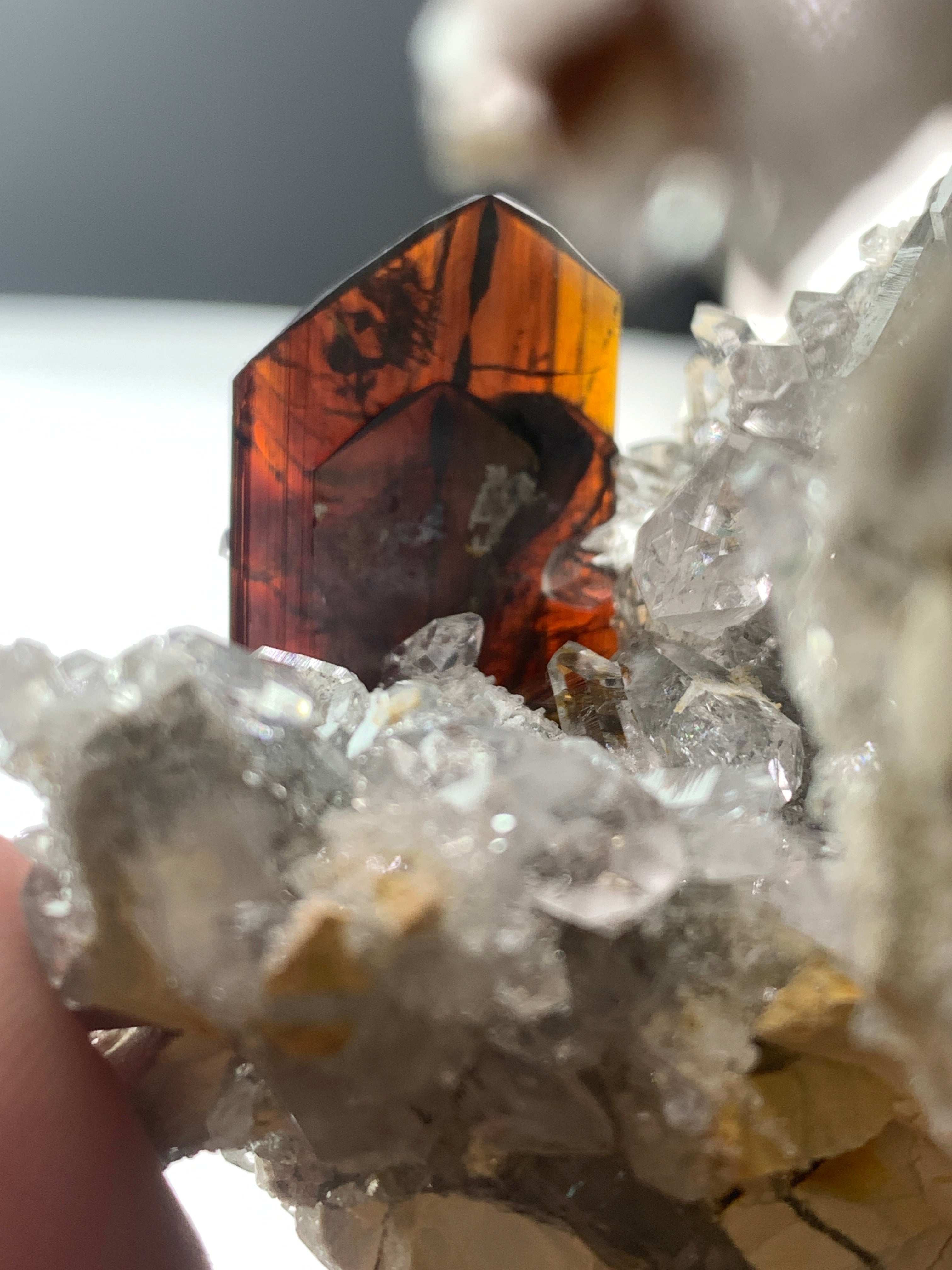 Red colour Brookite Crystals perched on Quartz matrix