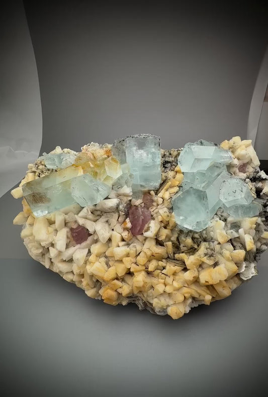 Aquamarine with Apatite and Feldspar.