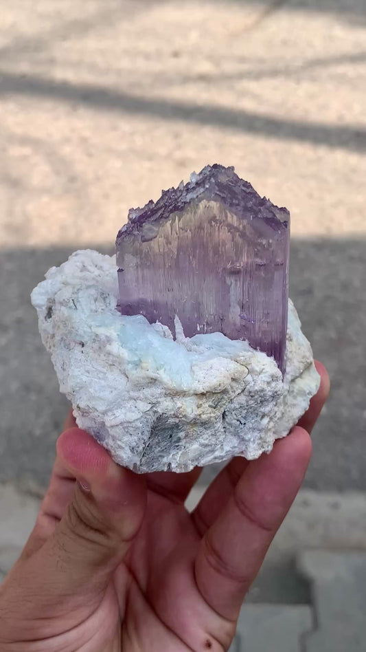 Terminated pink Kunzite on Matrix.